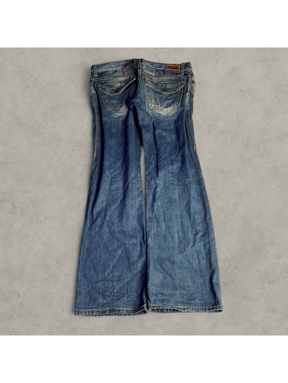 Robin's Jean Y2K-era low-rise flare Baggy jeans Distressed faded denim jeans